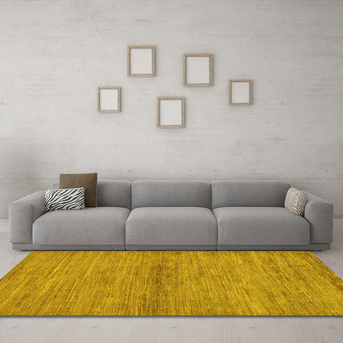 Machine Washable Abstract Yellow Modern Rug in a Living Room, wshabs105yw