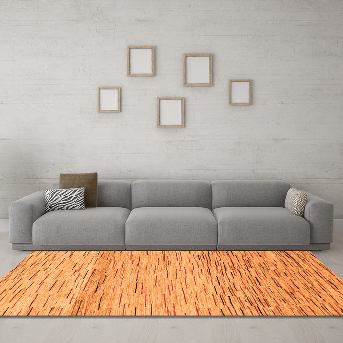 Machine Washable Abstract Orange Modern Area Rugs in a Living Room, wshabs10org