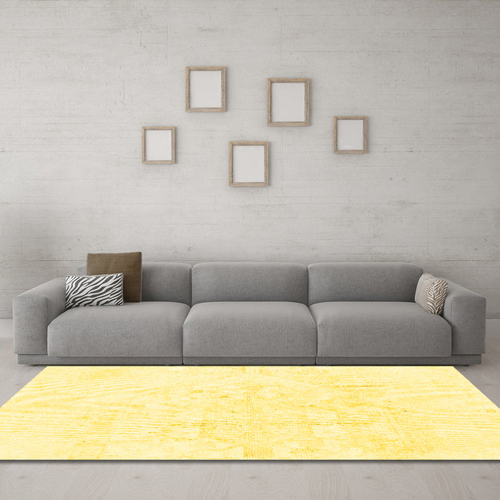 Machine Washable Solid Yellow Modern Rug in a Living Room, wshabs1166yw