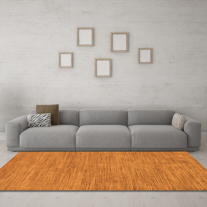 Machine Washable Abstract Orange Modern Area Rugs in a Living Room, wshabs116org