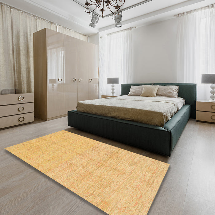 Machine Washable Abstract Saffron Yellow Rug in a Bedroom, wshabs1199
