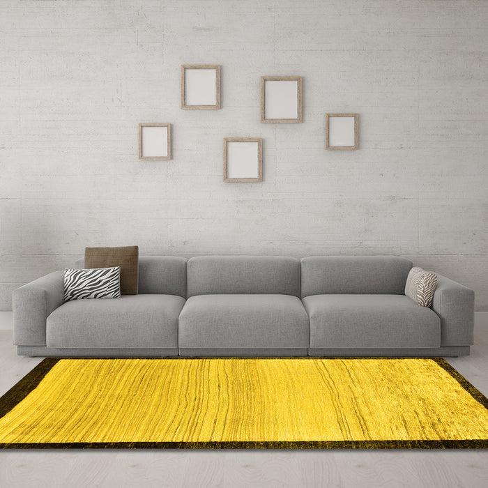 Machine Washable Solid Yellow Modern Rug in a Living Room, wshabs119yw