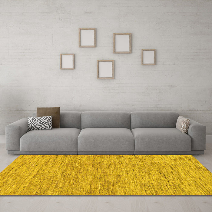 Machine Washable Solid Yellow Modern Rug in a Living Room, wshabs121yw