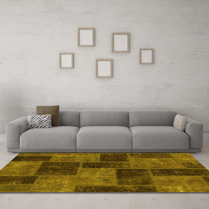 Machine Washable Patchwork Yellow Transitional Rug in a Living Room, wshabs1259yw