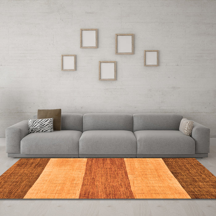 Machine Washable Abstract Orange Modern Area Rugs in a Living Room, wshabs130org