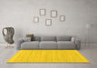 Machine Washable Solid Yellow Modern Rug in a Living Room, wshabs1336yw