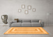 Machine Washable Solid Orange Modern Area Rugs in a Living Room, wshabs1337org