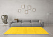 Machine Washable Solid Yellow Modern Rug in a Living Room, wshabs1341yw