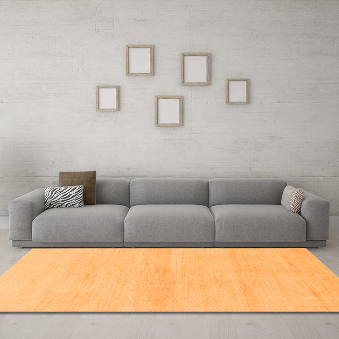 Machine Washable Solid Orange Modern Area Rugs in a Living Room, wshabs1341org