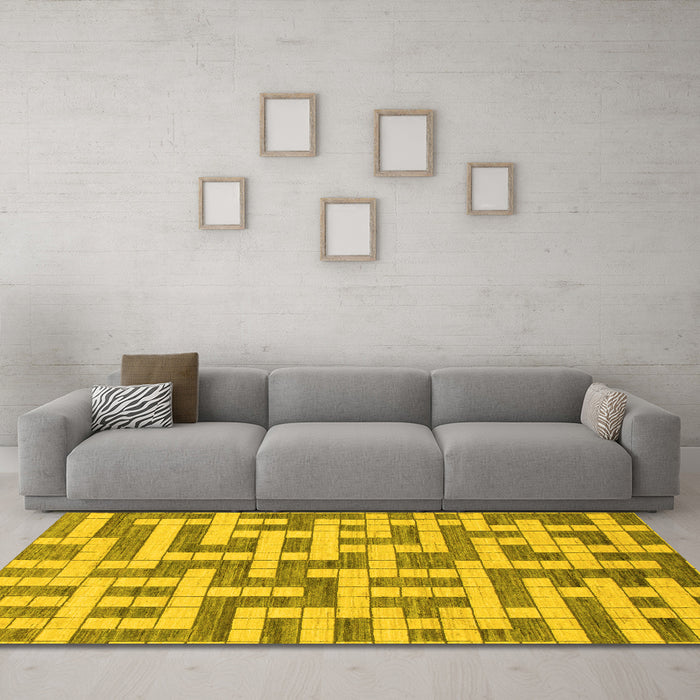 Machine Washable Solid Yellow Modern Rug in a Living Room, wshabs1343yw
