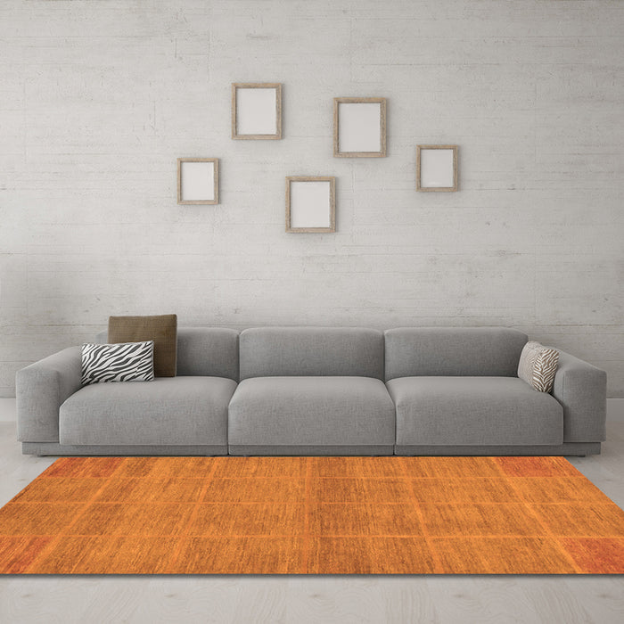 Machine Washable Abstract Orange Modern Area Rugs in a Living Room, wshabs1347org