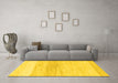 Machine Washable Solid Yellow Modern Rug in a Living Room, wshabs1356yw