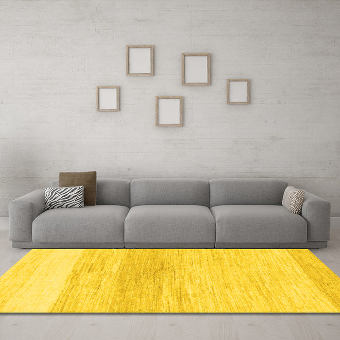 Machine Washable Solid Yellow Modern Rug in a Living Room, wshabs1356yw