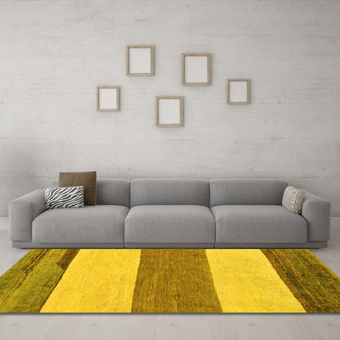 Machine Washable Solid Yellow Modern Rug in a Living Room, wshabs135yw