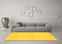 Machine Washable Solid Yellow Modern Rug in a Living Room, wshabs136yw