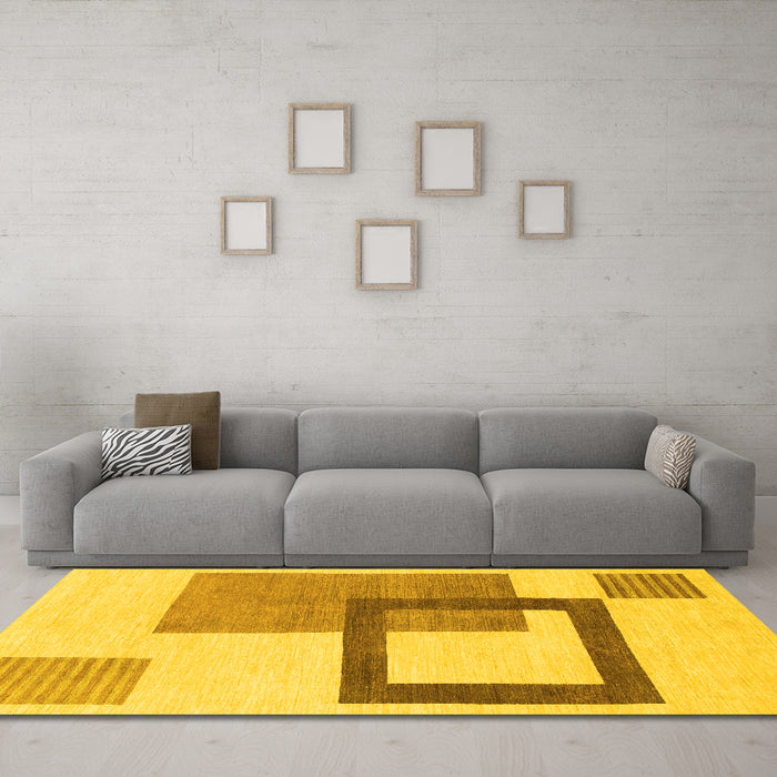 Machine Washable Solid Yellow Modern Rug in a Living Room, wshabs1376yw