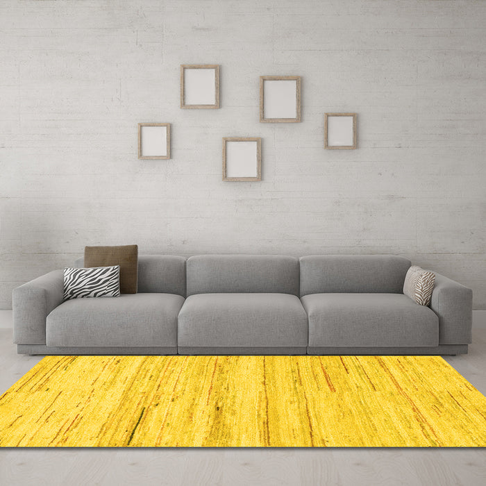 Machine Washable Solid Yellow Modern Rug in a Living Room, wshabs1378yw