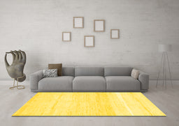 Machine Washable Solid Yellow Modern Rug in a Living Room, wshabs1380yw