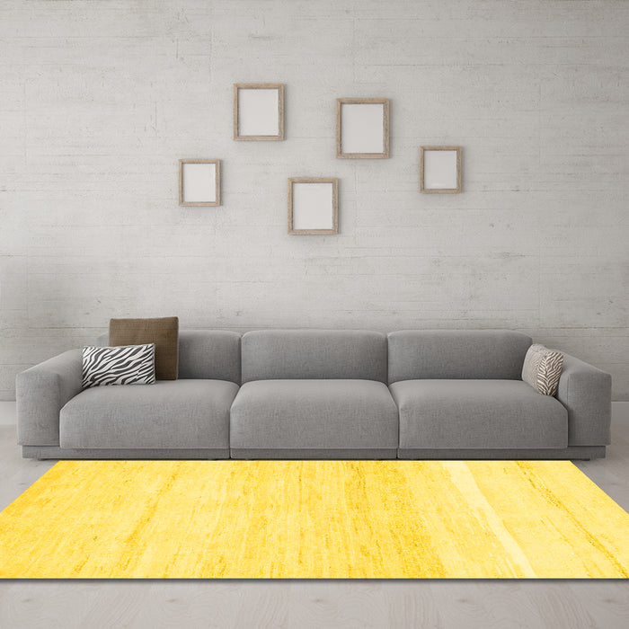 Machine Washable Solid Yellow Modern Rug in a Living Room, wshabs1380yw