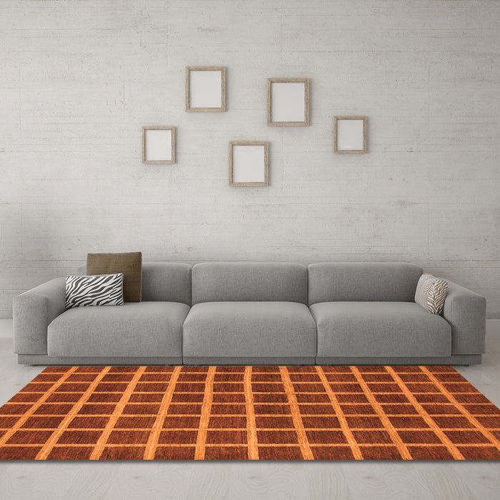 Machine Washable Checkered Orange Modern Area Rugs in a Living Room, wshabs1382org