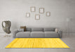 Machine Washable Solid Yellow Modern Rug in a Living Room, wshabs1390yw