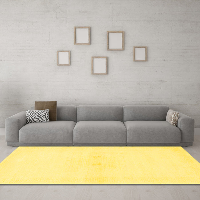 Machine Washable Solid Yellow Modern Rug in a Living Room, wshabs1398yw