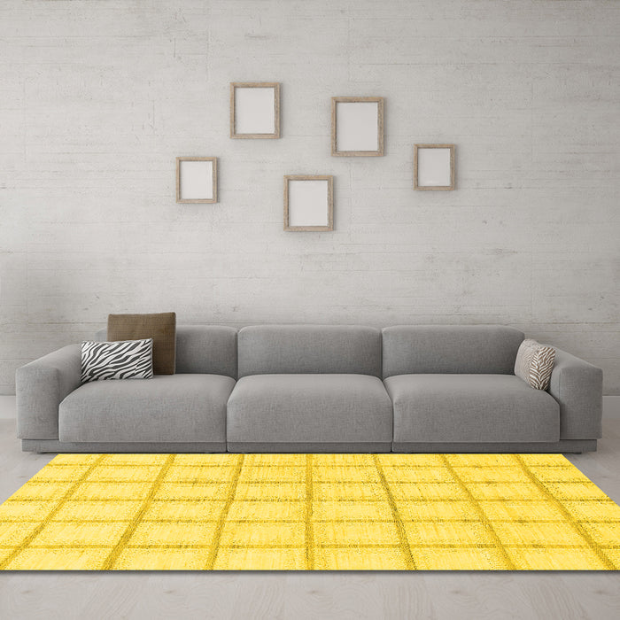 Machine Washable Solid Yellow Modern Rug in a Living Room, wshabs1404yw