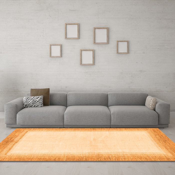 Machine Washable Solid Orange Modern Area Rugs in a Living Room, wshabs1407org