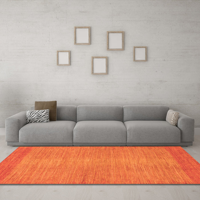 Machine Washable Abstract Orange Modern Area Rugs in a Living Room, wshabs1408org