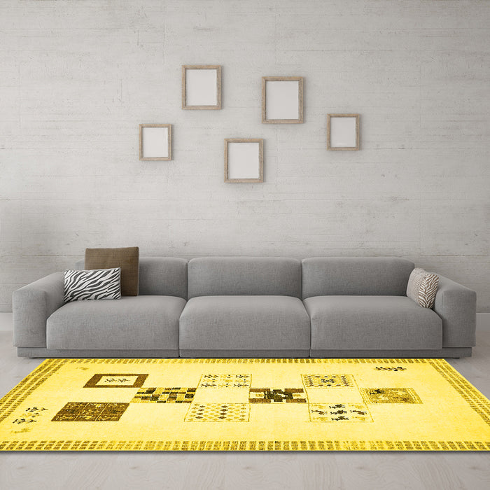 Machine Washable Solid Yellow Modern Rug in a Living Room, wshabs140yw