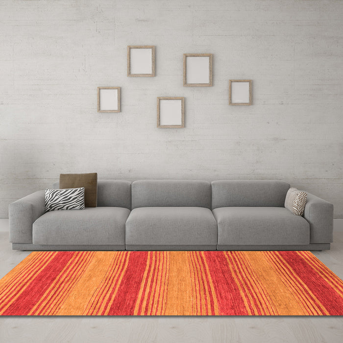 Machine Washable Abstract Orange Modern Area Rugs in a Living Room, wshabs1410org