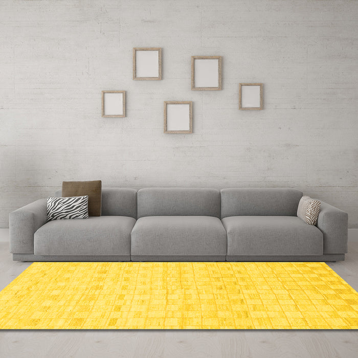Machine Washable Solid Yellow Modern Rug in a Living Room, wshabs1411yw