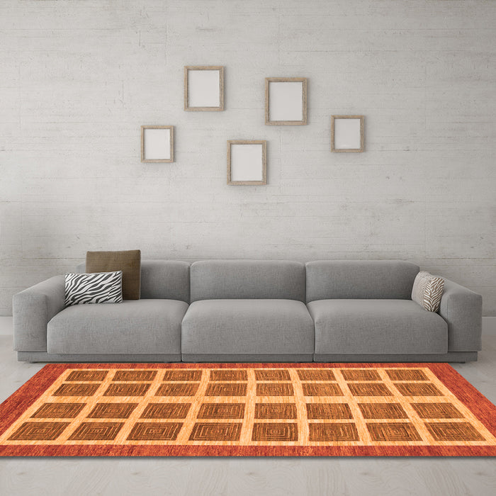 Machine Washable Abstract Orange Modern Area Rugs in a Living Room, wshabs1412org