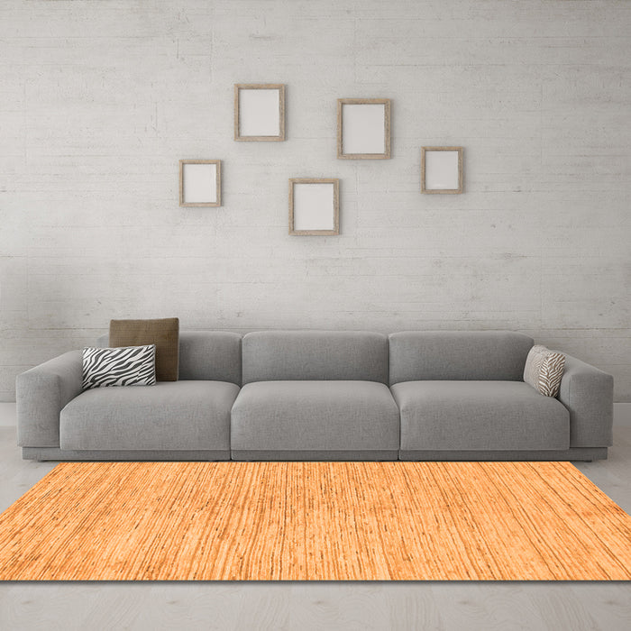 Machine Washable Solid Orange Modern Area Rugs in a Living Room, wshabs1417org