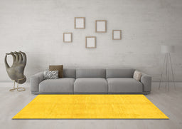 Machine Washable Solid Yellow Modern Rug in a Living Room, wshabs1419yw