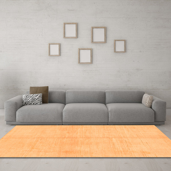 Machine Washable Solid Orange Modern Area Rugs in a Living Room, wshabs1419org