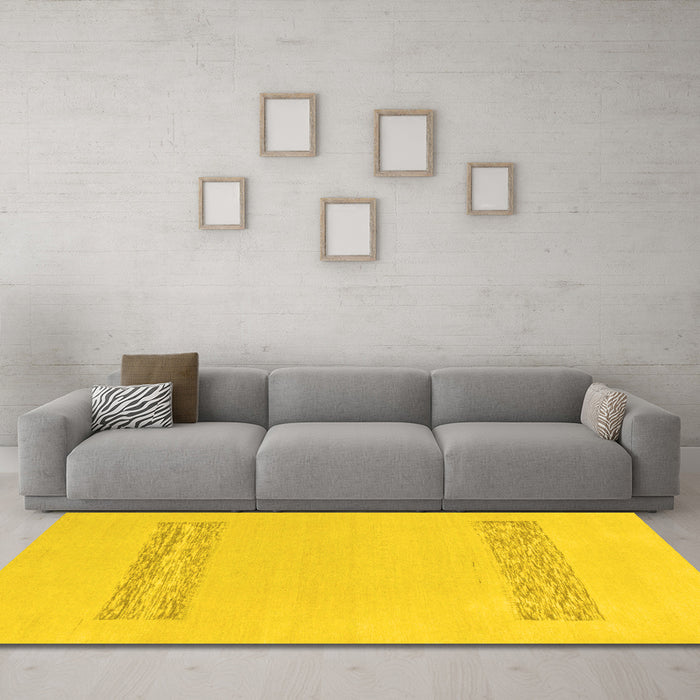 Machine Washable Solid Yellow Modern Rug in a Living Room, wshabs141yw