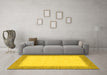 Machine Washable Solid Yellow Modern Rug in a Living Room, wshabs1424yw