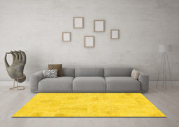 Machine Washable Solid Yellow Modern Rug in a Living Room, wshabs1428yw