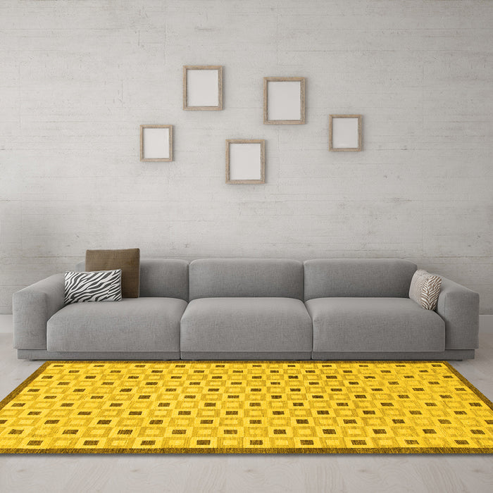 Machine Washable Solid Yellow Modern Rug in a Living Room, wshabs1430yw