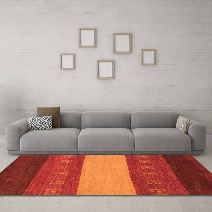 Machine Washable Abstract Orange Modern Area Rugs in a Living Room, wshabs1447org