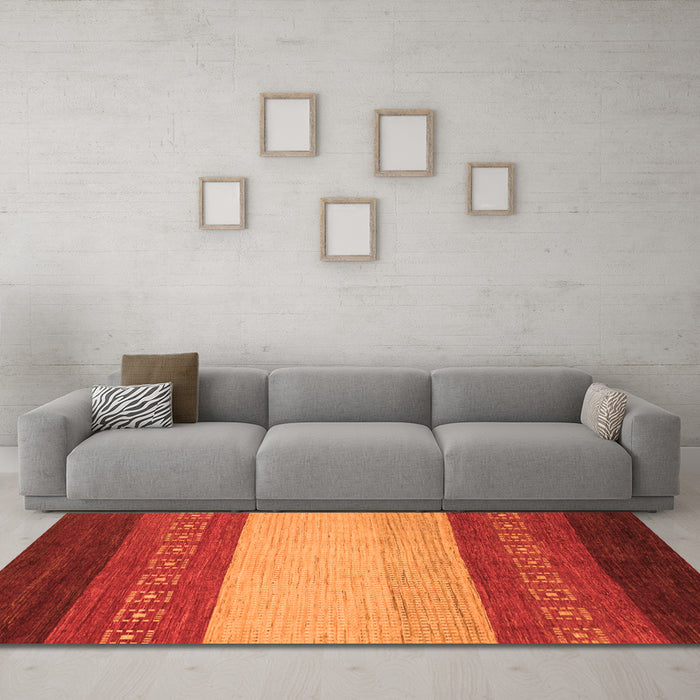 Machine Washable Abstract Orange Modern Area Rugs in a Living Room, wshabs1449org