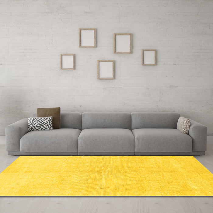 Machine Washable Solid Yellow Modern Rug in a Living Room, wshabs1460yw