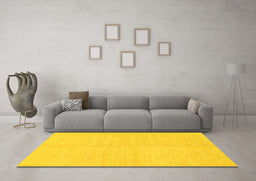 Machine Washable Solid Yellow Modern Rug in a Living Room, wshabs1493yw