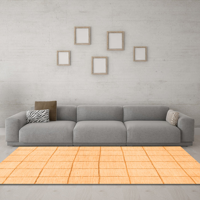 Machine Washable Solid Orange Modern Area Rugs in a Living Room, wshabs1514org