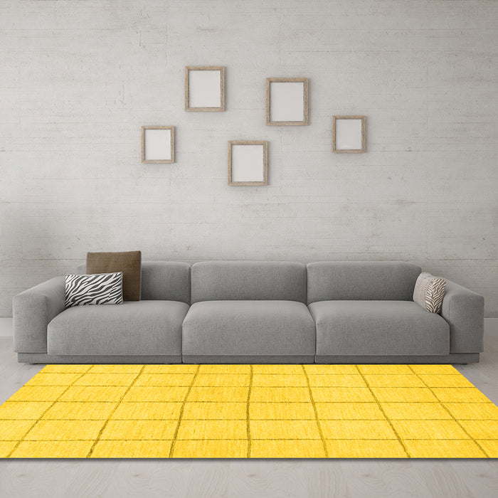 Machine Washable Solid Yellow Modern Rug in a Living Room, wshabs1514yw