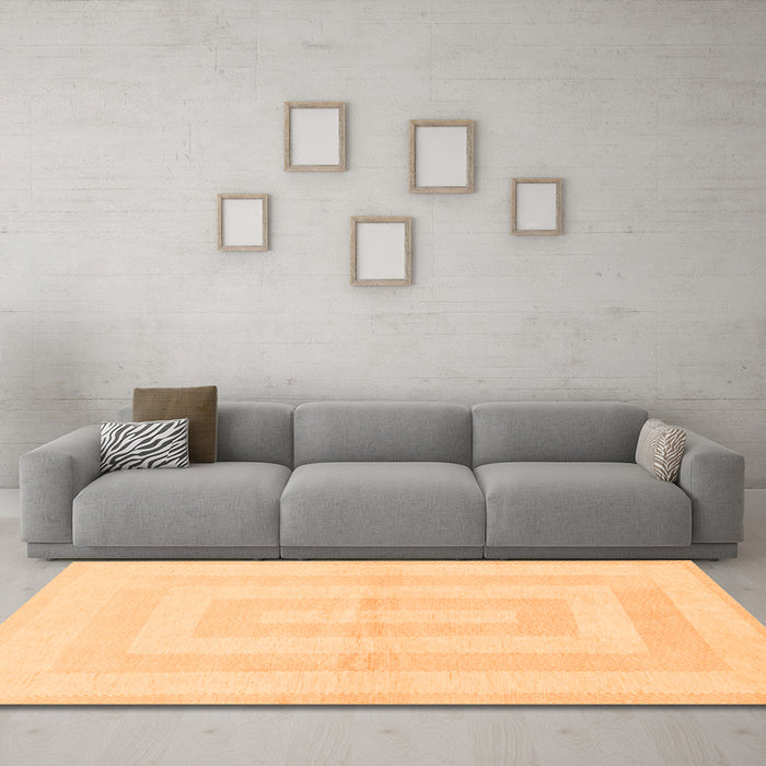Machine Washable Solid Orange Modern Area Rugs in a Living Room, wshabs1519org