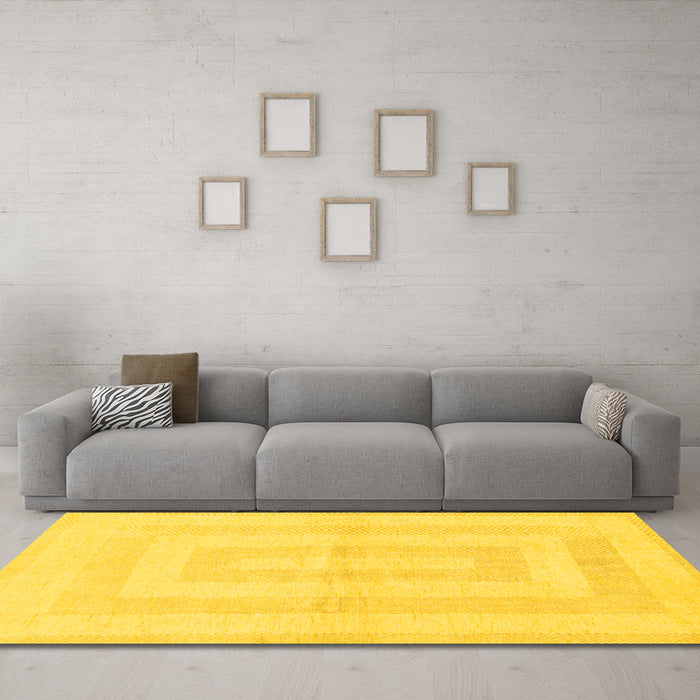 Machine Washable Solid Yellow Modern Rug in a Living Room, wshabs1519yw