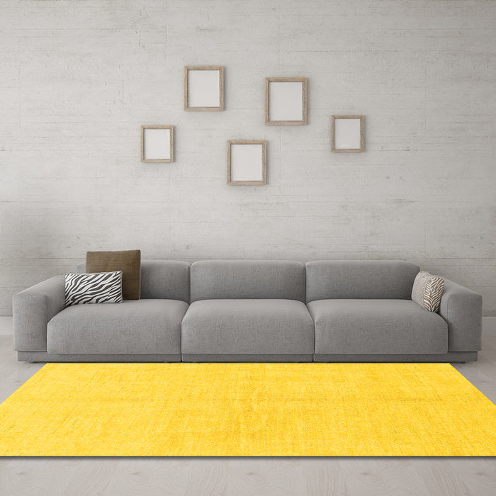 Machine Washable Solid Yellow Modern Rug in a Living Room, wshabs1520yw