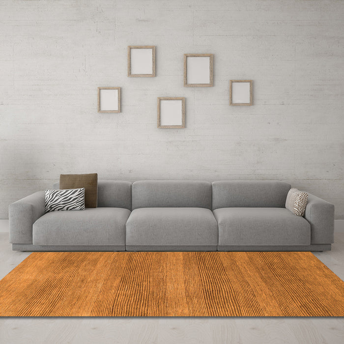 Machine Washable Abstract Orange Modern Area Rugs in a Living Room, wshabs1529org